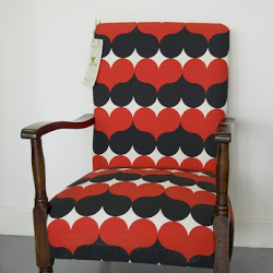 A refurbished armchair by Rediscover Furniture - a WISER LIFE eco-cluster enterprise.